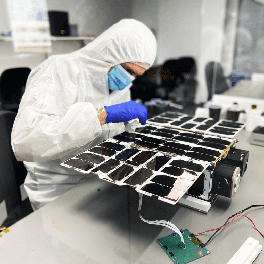 NanoAvionics engineer assembing 6U nanosatellite 2020